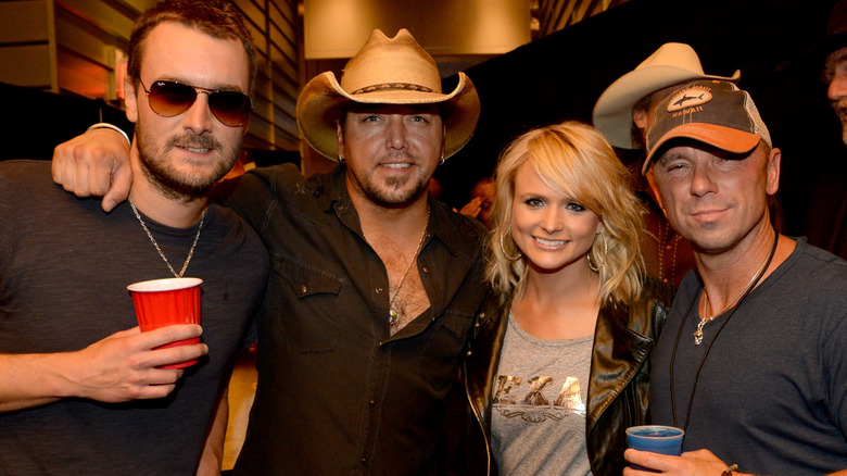 Eric Church and Miranda Lambert pose with friends