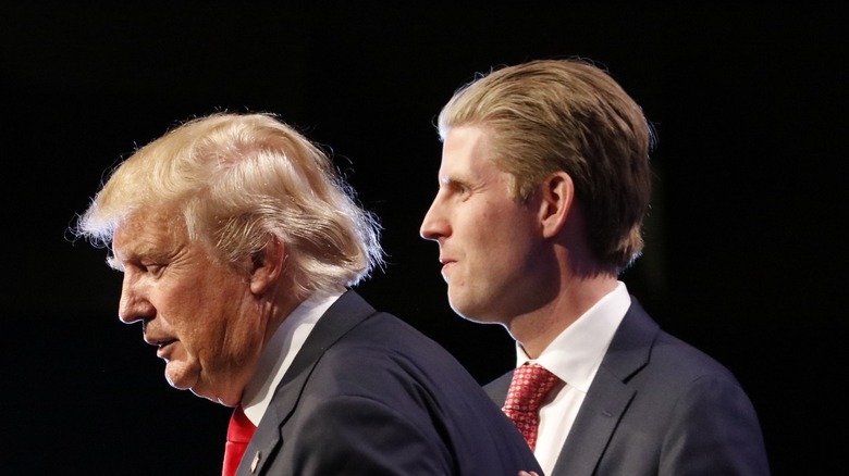 Eric Trump behind Donald Trump