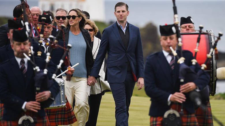 Eric Trump, Lara Trump, bagpipe players walking