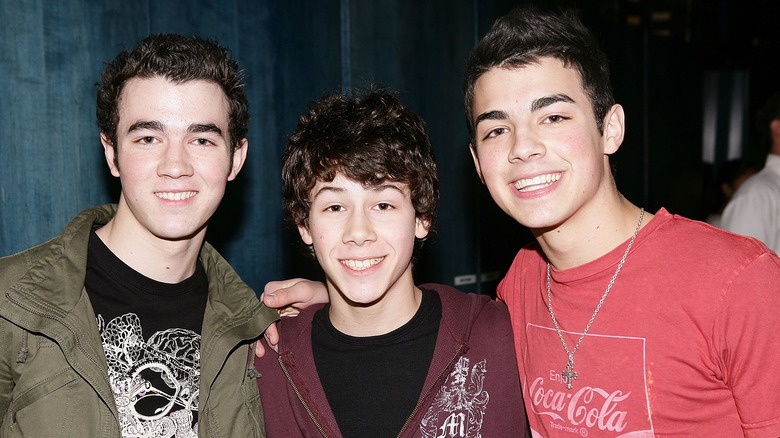 The Jonas Brothers smiling