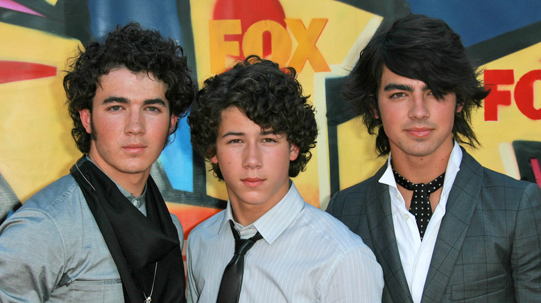 The Jonas Brothers posing