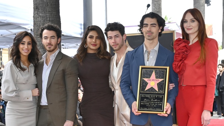 The Jonas Brothers and their wives