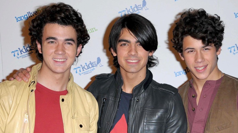 The Jonas Brothers smiling