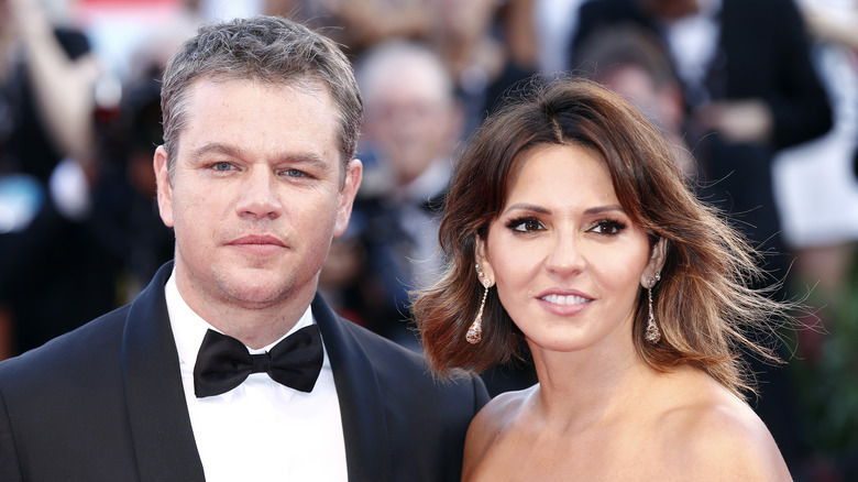  Matt Damon posing with Luciana Barroso