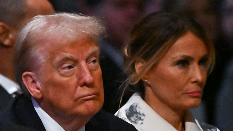 Donald and Melania Trump sitting at Jimmy Carter's funeral