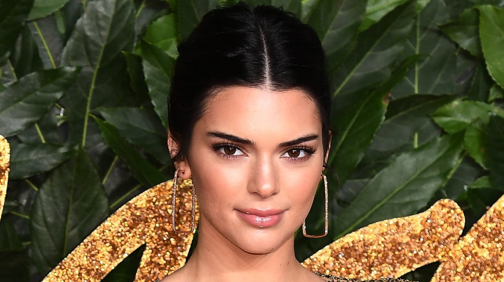 Kendall Jenner with big gold earrings