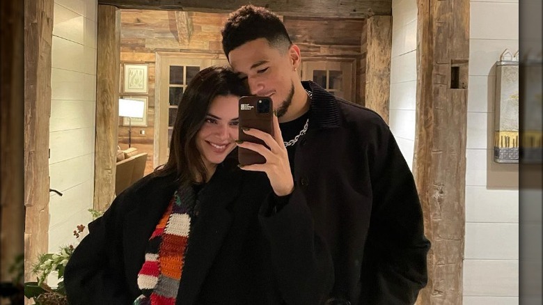 Kendall Jenner taking a selfie with Devin Booker