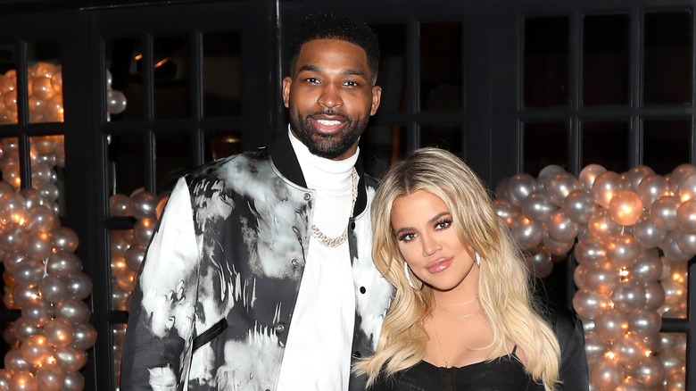 Tristan Thompson cuddling Khloe Kardashian