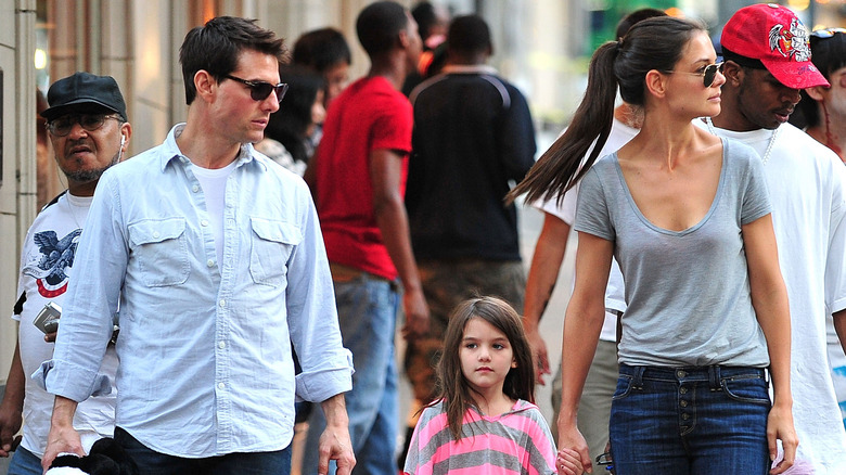 Tom Cruise, daughter Suri Cruise holds Katie Holmes' hand