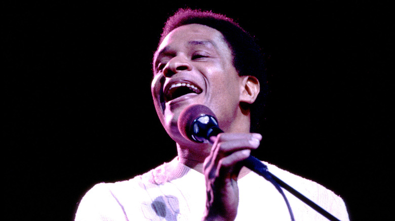 Al Jarreau singing onstage