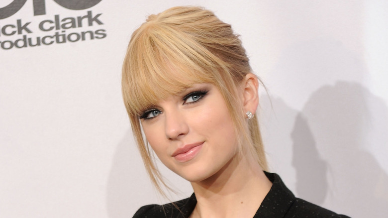 Taylor Swift in a black jacket