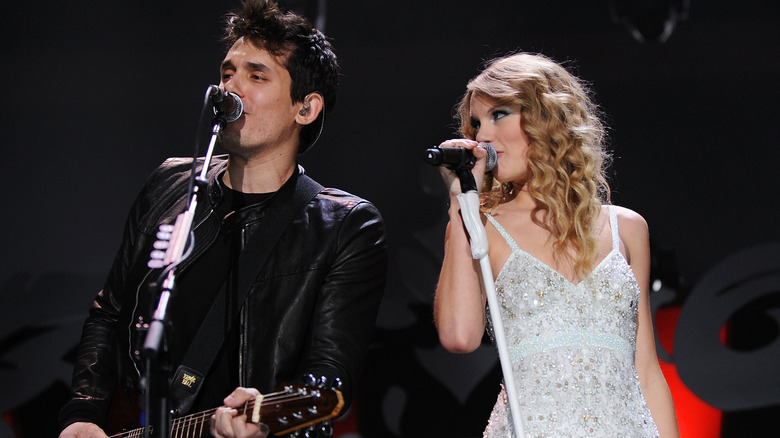 Taylor Swift and John Mayer performing together