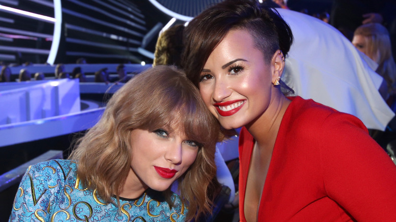 Taylor Swift and Demi Lovato posing together