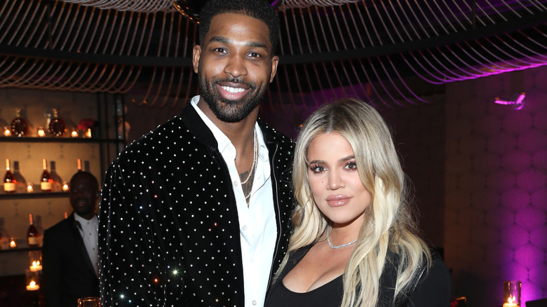 Tristan Thompson and Khloé Kardashian pose for photos