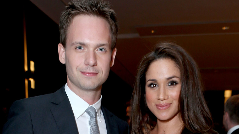 Patrick J. Adams and Meghan Markle at an event