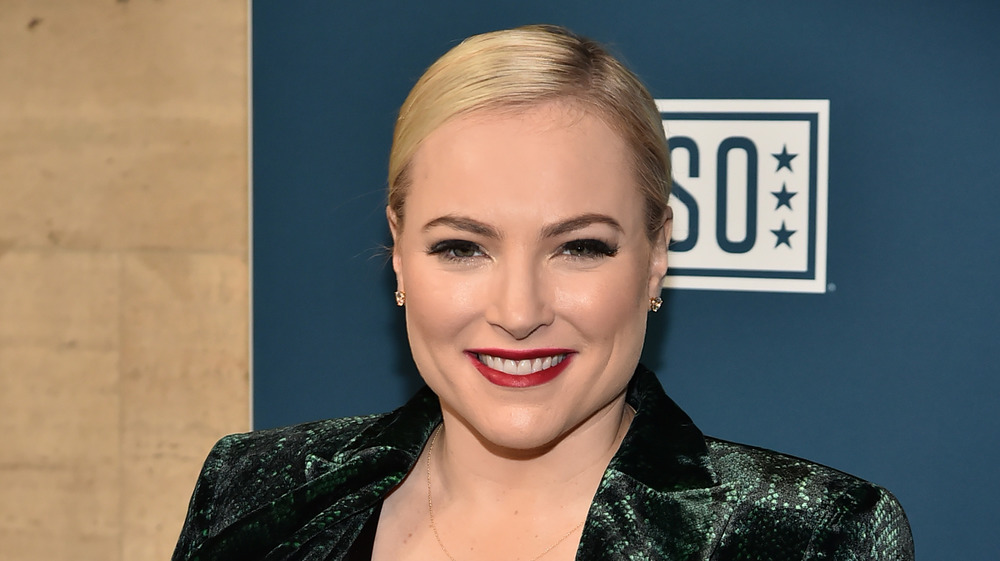 Meghan McCain smiling and posing