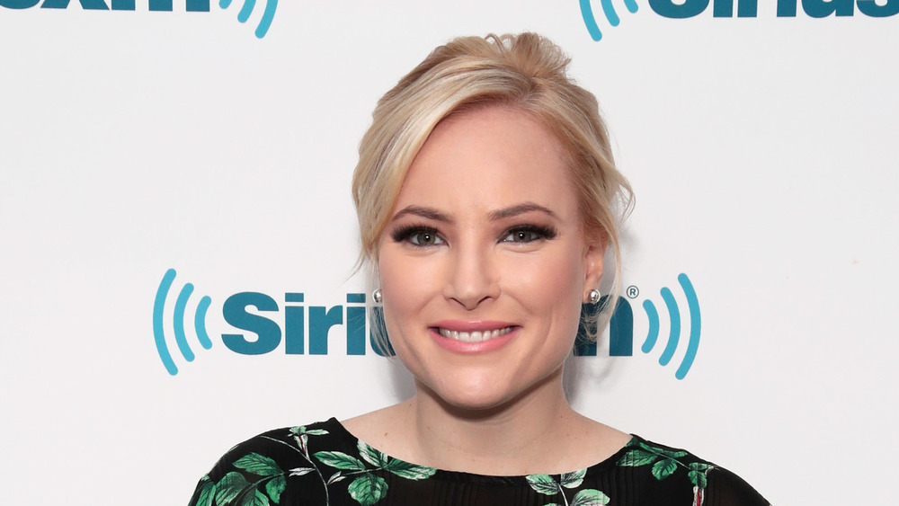 Meghan McCain smiling and posing