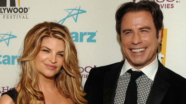 Kirstie Alley posing with John Travolta