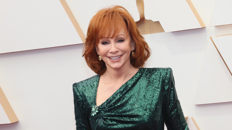 Reba McEntire in a green sequined dress