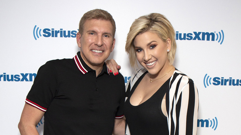 Savannah and Todd Chrisley pose together