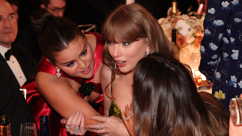 Taylor Swift and Selena Gomez talking