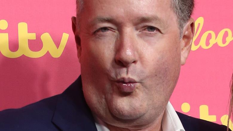 Piers Morgan pouting lips kiss