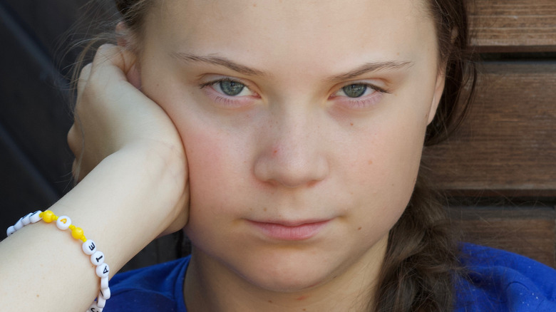 Greta Thunberg resting face on hand