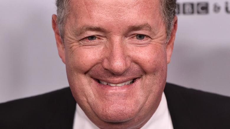 Piers Morgan grinning smugly