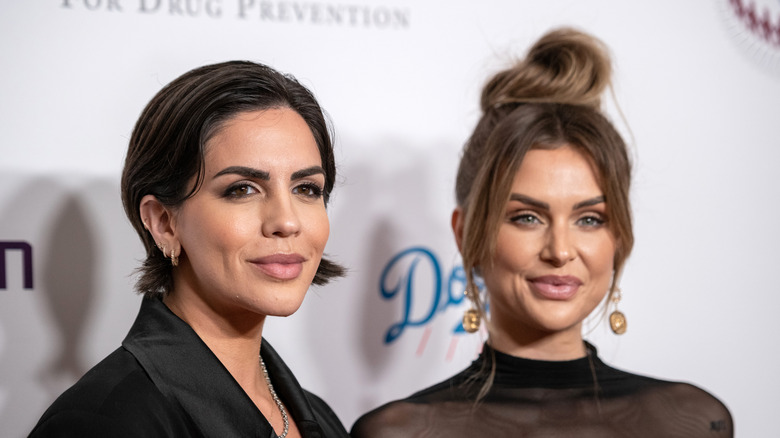 Katie Malone and LaLa Kent smiling at red carpet event