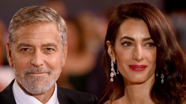 George Clooney and Amal Clooney with soft smiles