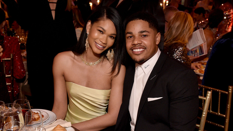 Chanel Iman and Sterling Shepard sitting at a dinner table