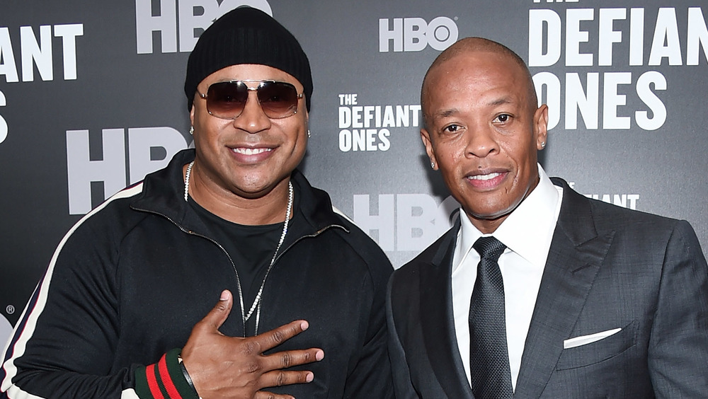 LL Cool J and Dr. Dre posing together on the red carpet