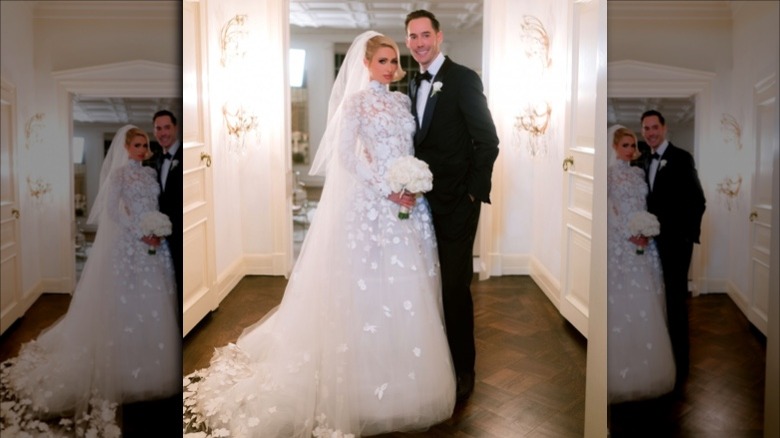 Paris Hilton and Carter Reum pose together on wedding day