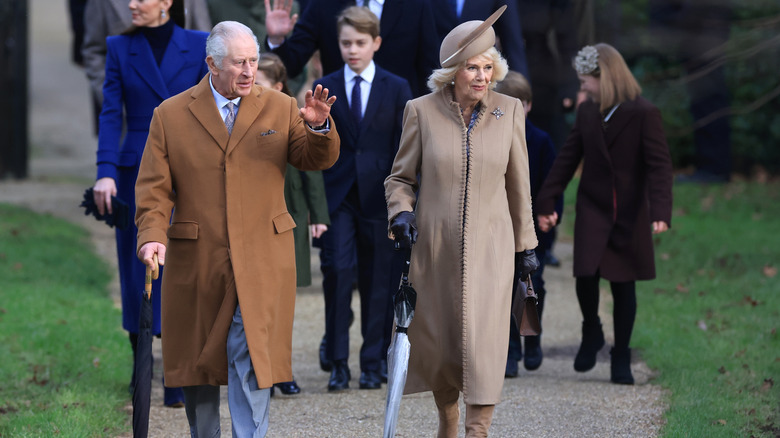 King Charles and Queen Camilla walking