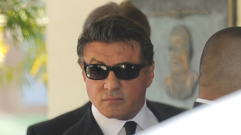 Sylvester Stallone in funeral sunglasses