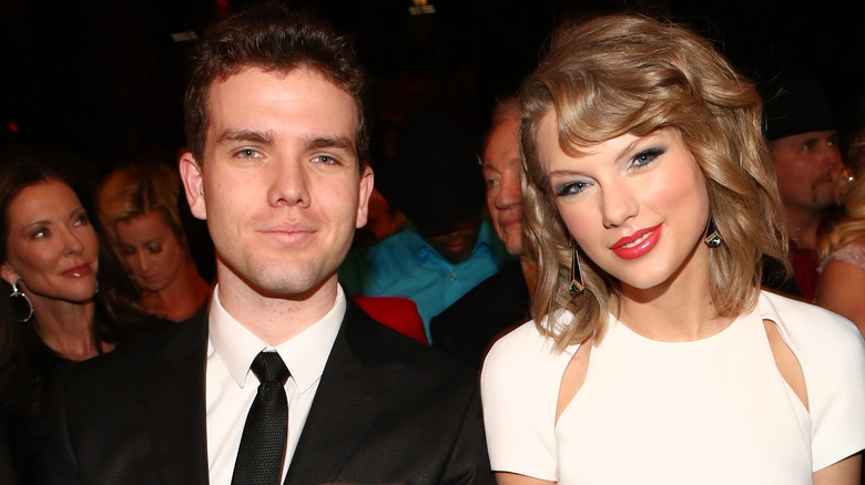 Austin and Taylor Swift sitting in the audience at an awards show