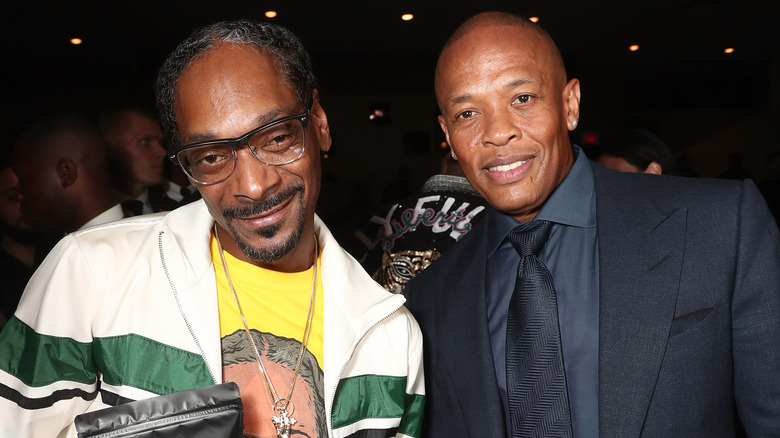 Snoop Dogg and Dr. Dre smiling