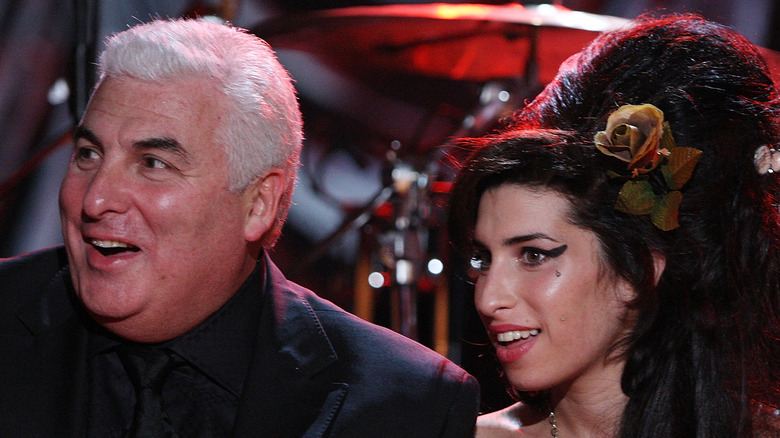 Mitch Winehouse and Amy Winehouse at an award show