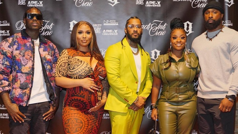 Black Ink Crew Chicago original cast members pose on the red carpet