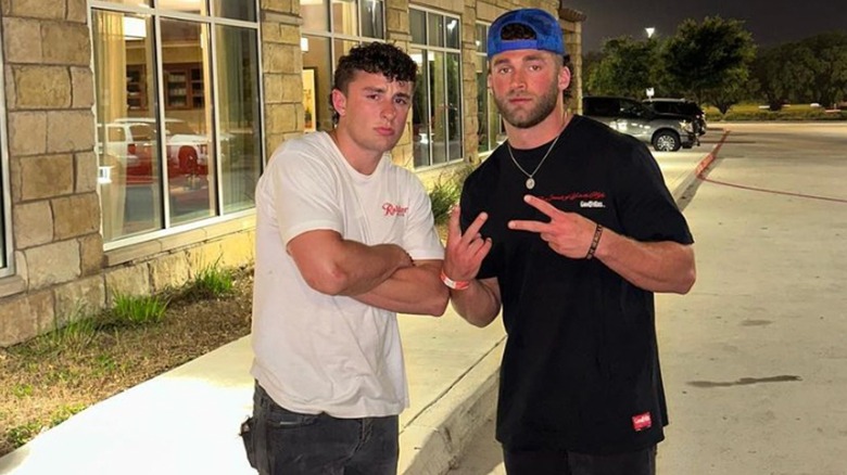 Kade Wilcox and Kaleb Winterburn posing outside