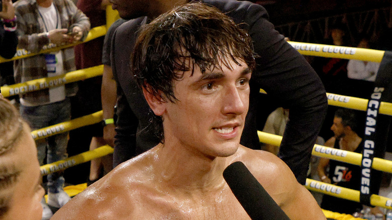 Bryce Hall giving an interview in a boxing ring