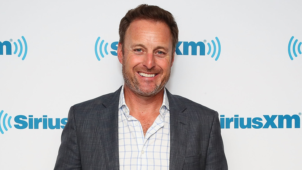 Chris Harrison smiling at an event