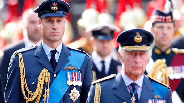 Prince William and King Charles in uniform