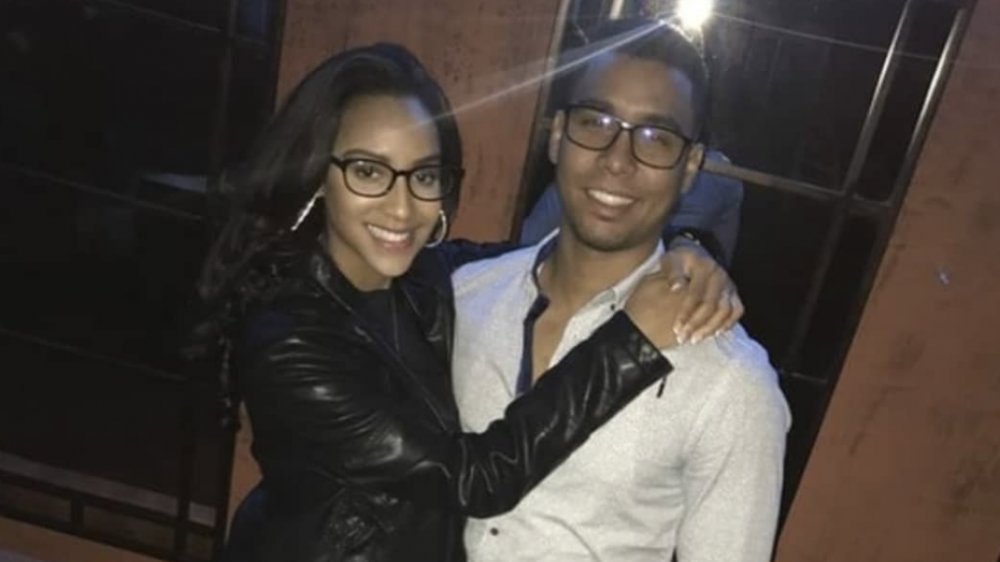 Chantel Jimeno and Pedro Jimeno both wearing thick black glasses