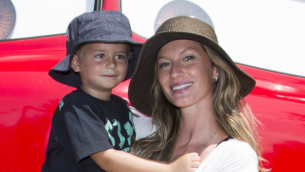 Gisele Bundchen holding son Benjamin Brady 