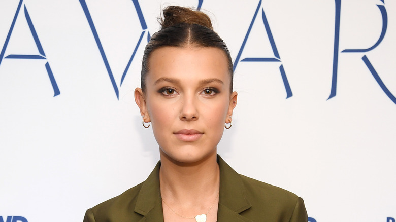 Millie Bobby Brown poses red carpet