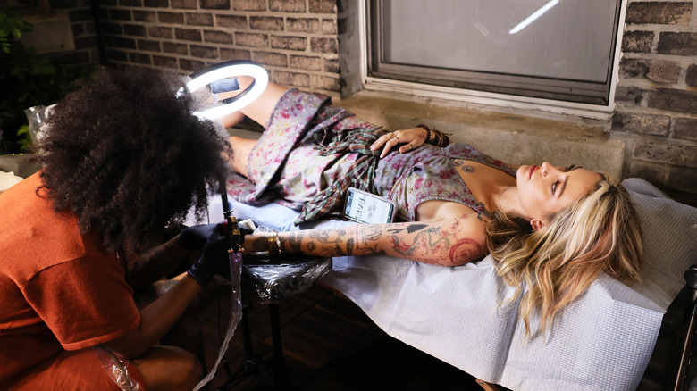 Paris Jackson getting a tattoo