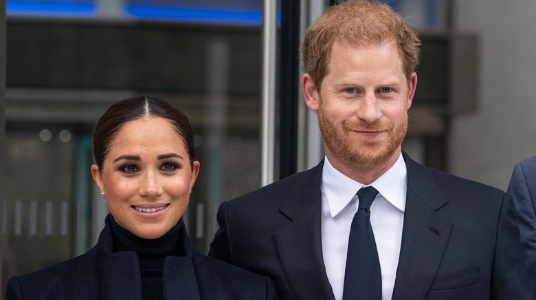 Prince Harry and Meghan Markle smiling