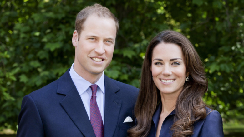 Prince William and Kate Middleton posing for official tour portrait