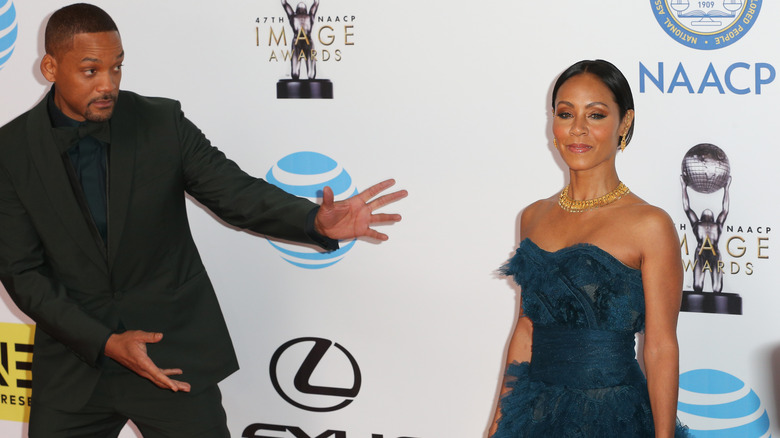 Will Smith and Jada Pinkett posing on the red carpet